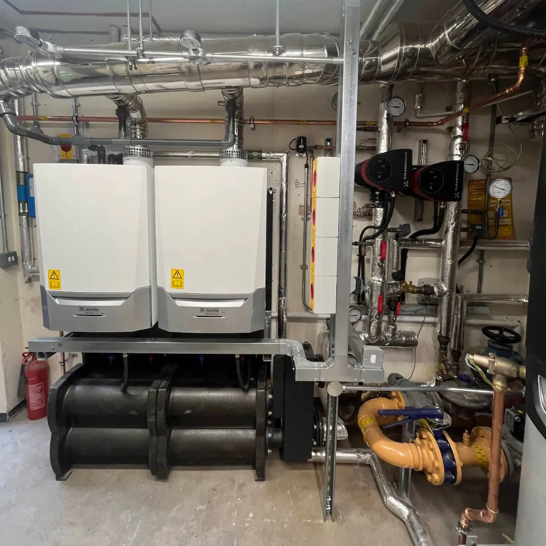 Commercial boiler room with heating equipment.